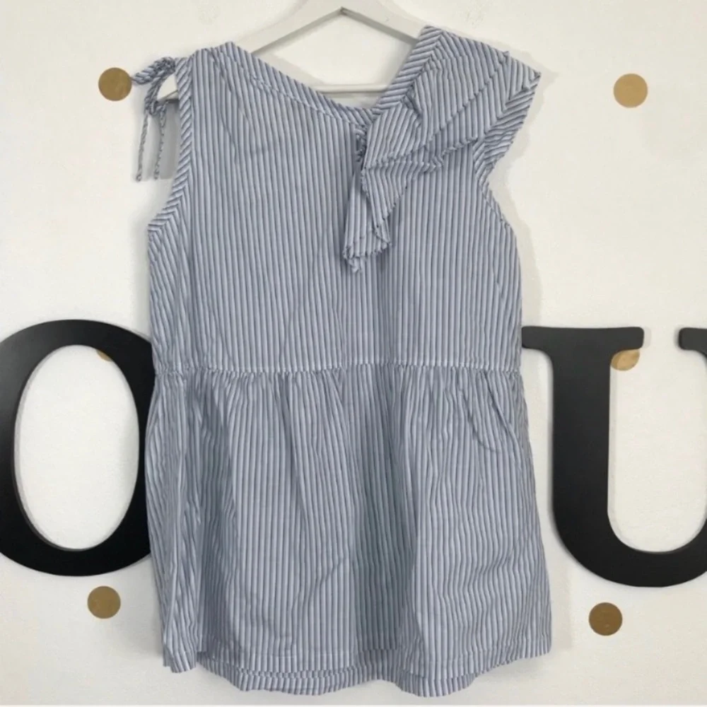 Left of Center M top size M